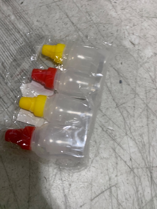 Photo 1 of 4 Pcs Mini Plastic Squeeze Bottles - Friendly for Office, Lunchbox, Picnic - Holds Ketchup, Oil, Honey and Condiments?