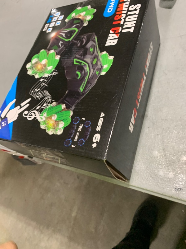 Photo 1 of Gesture Sensing RC Stunt Car, Remote Control Car Toys for Boys 6-8-12, 360° Rotating 4WD Twist Cars with Light Music & Spray, Birthday Gift for Kids Age 6 7 8 9 10 11 12, 2.4Ghz Hand Controlled Toy