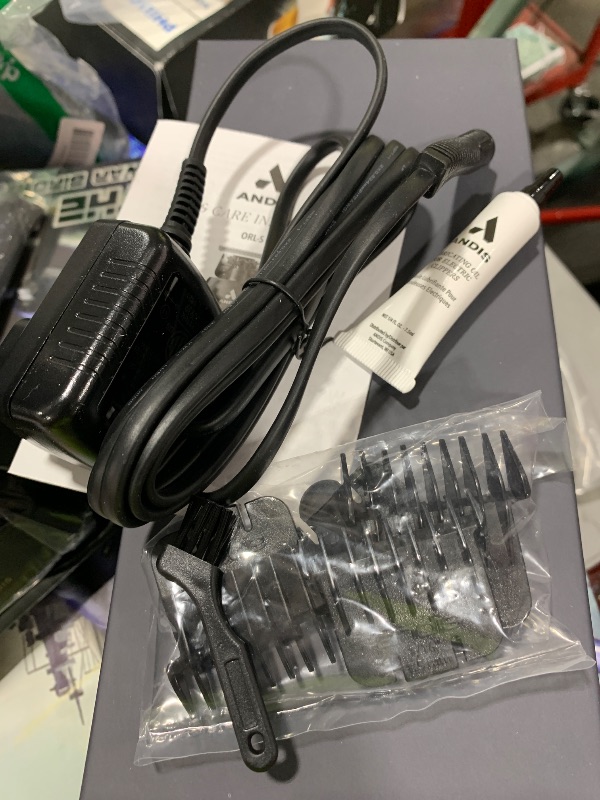 Photo 1 of Andis 74150 GTX-EXO Professional Cord/Cordless Lithium-ion Electric Beard & Hair Trimmer with Charging Stand, Black