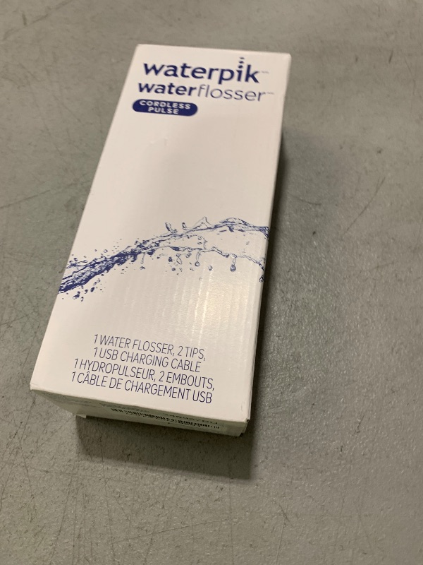 Photo 1 of Waterpik Cordless Pulse Rechargeable Portable Water Flosser for Teeth, Gums, Braces Care and Travel with 2 Flossing Tips, Waterproof, ADA Accepted, WF-20 Blue, Packaging May Vary