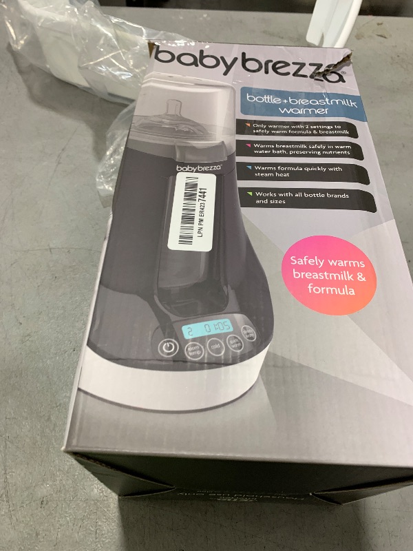 Photo 1 of Baby Brezza Fast Baby Bottle Warmer - Baby Milk Warmer + Breastmilk Warmer Defroster – 2 Unique Temperatures for Breastmilk + Formula - Universal Fit for All Bottles, Storage Bags + Food Jars