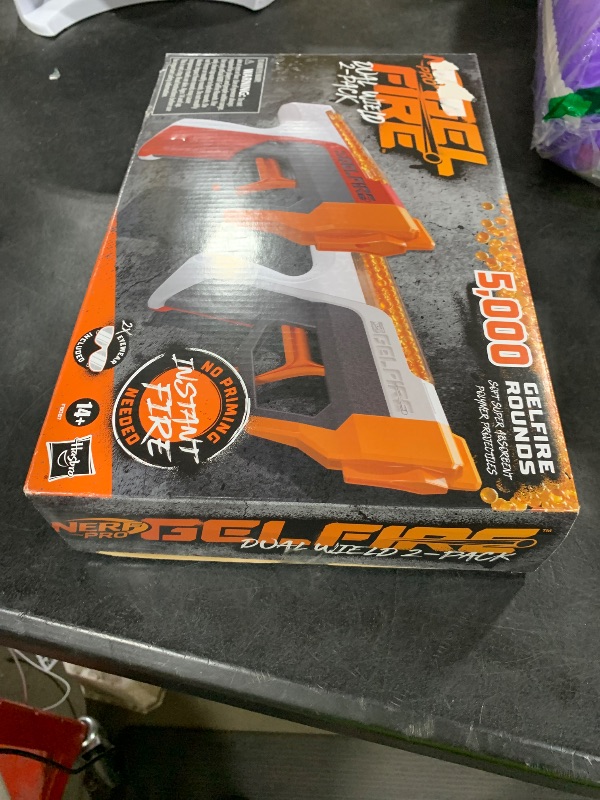 Photo 1 of NERF Pro Gelfire Dual Wield Pack, 2 Blasters, No-Prime Firing, 5000 Gelfire Rounds, 2X 100 Round Integrated Hoppers, 2 Eyewear, Ages 14 & Up
