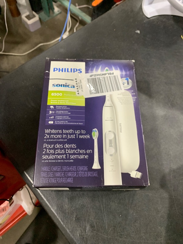 Photo 1 of Philips Sonicare ProtectiveClean 6500 Rechargeable Electric Toothbrush, with Pressure Sensor, 3 Cleaning Modes, SmarTimer and QuadPacer, 14-Day Battery Life, Charging Travel Case, White, HX6462/05