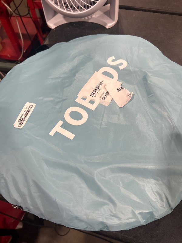 Photo 1 of blue pull out tent 