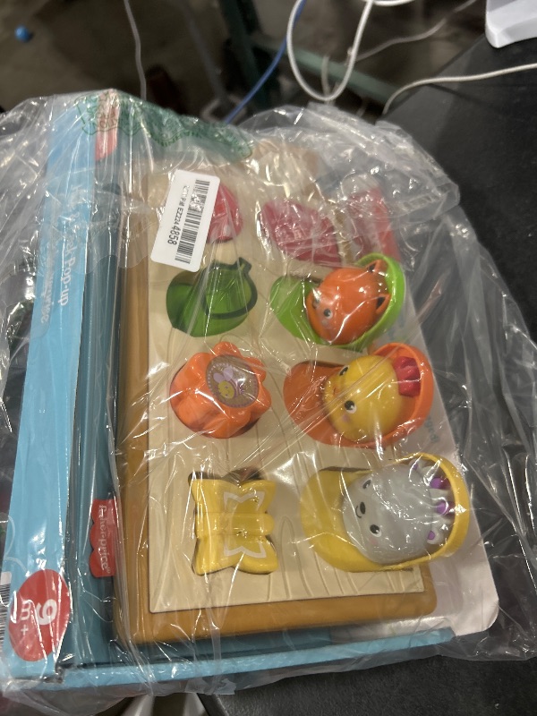 Photo 1 of Fisher-Price Baby Toy Hide & Peek Pop-Up Animal-Themed Sensory Activity with Wood Accents & Sounds for Ages 9+ Months