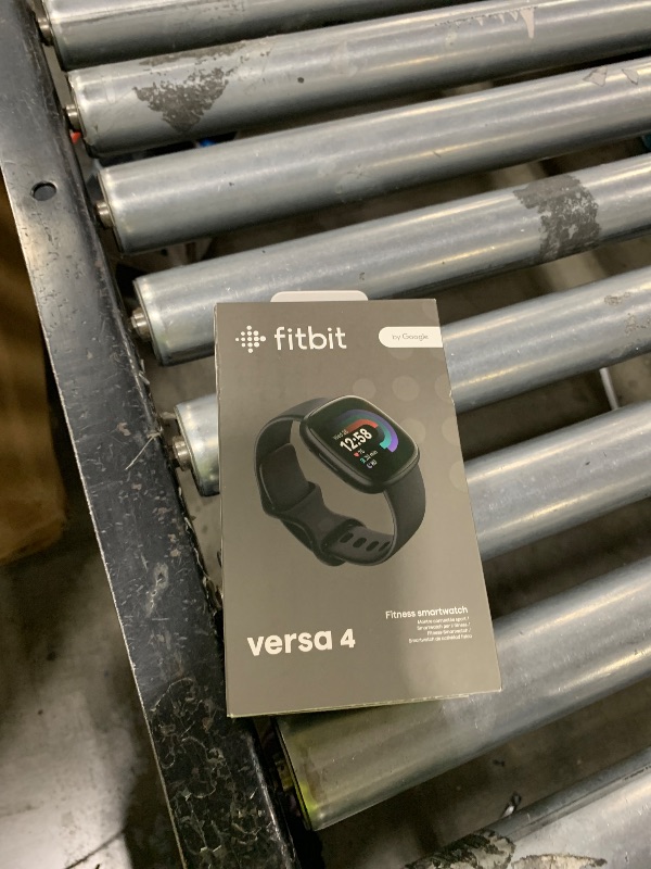 Photo 1 of Fitbit Versa 4 Fitness Smartwatch with Daily Readiness, GPS, 24/7 Heart Rate, 40+ Exercise Modes, Sleep Tracking and more, Black/Graphite, One Size (S & L Bands Included)