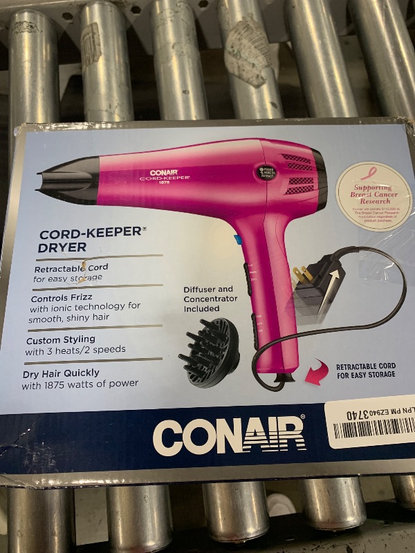 Photo 1 of Conair Hair Dryer with Retractable Cord, 1875W Cord-Keeper Blow Dryer,Pink