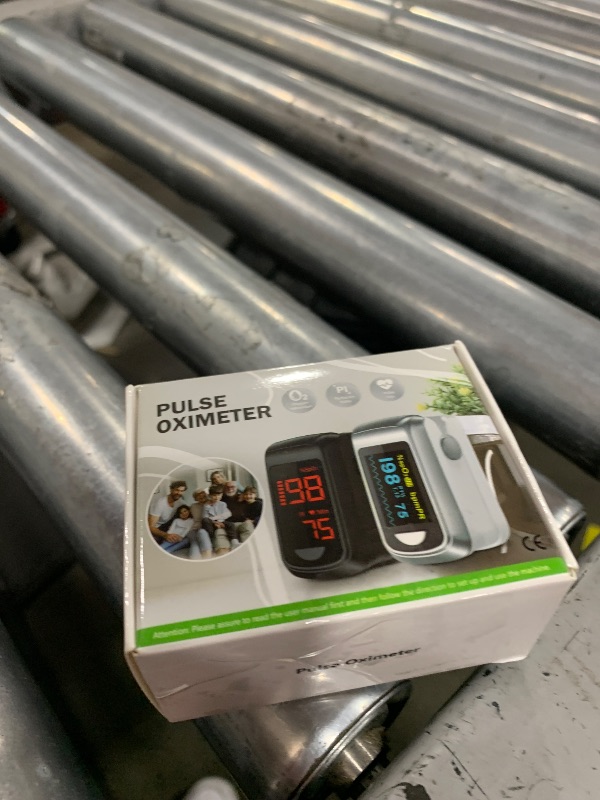 Photo 1 of Fingertip Pulse Oximeter Blood Oxygen Monitor Pulse Ox, Heart Rate and Fast Spo2 Reading Oxygen Meter with OLED Screen Included Batteries and Lanyard