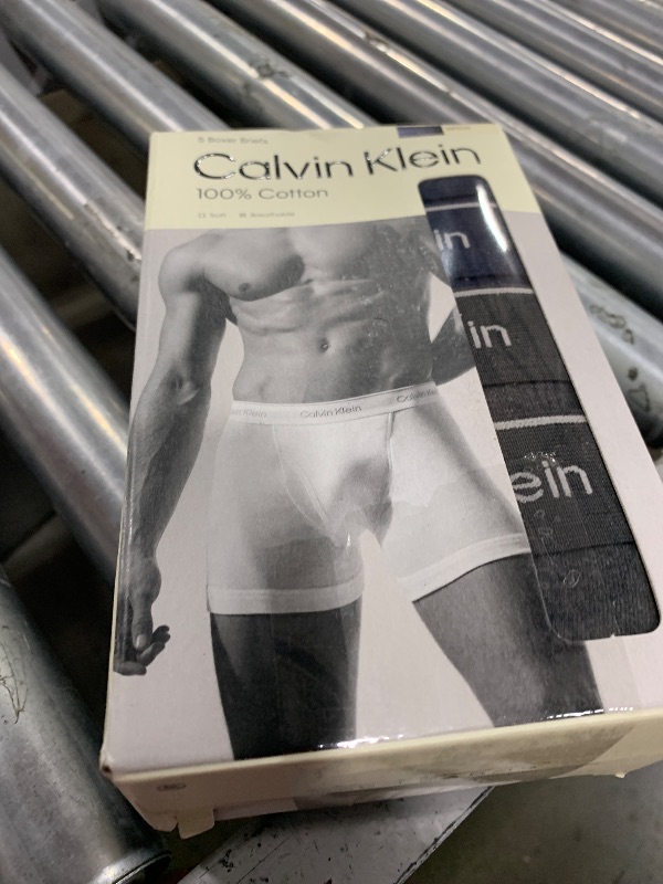 Photo 1 of Calvin Klein Men's Cotton Classics 5-pack Boxer Brief, 2 Blue Shadow Body W/Blue Shadow Waistband, 2 Charcoal Heather Body W/Charcoal Heather Waistband, 1 Black Body W/Black Waistband, Small1054104400
