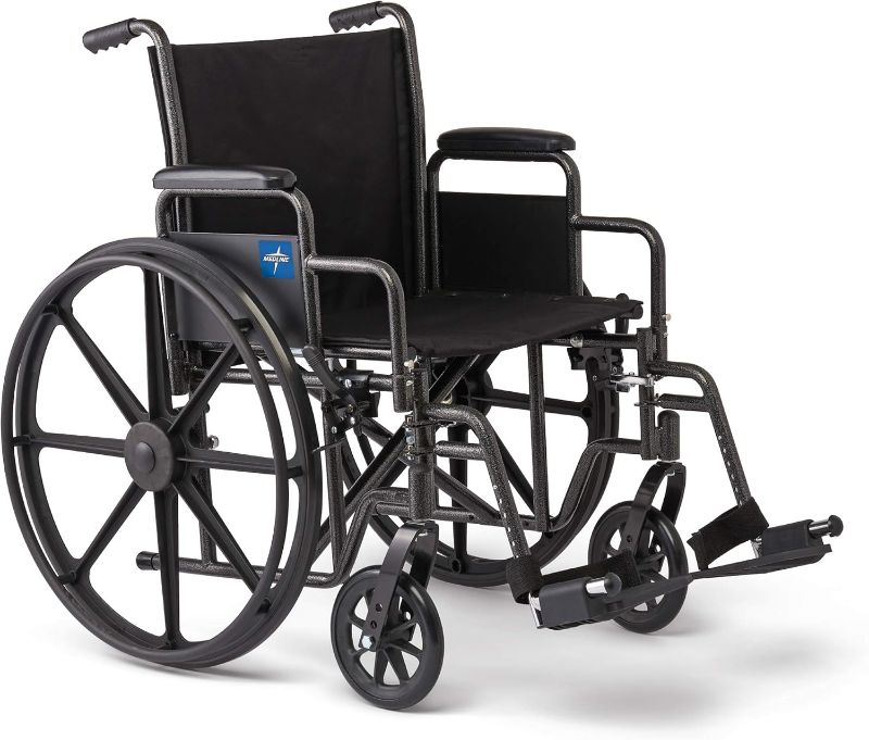 Photo 1 of Medline Comfortable Folding Wheelchair with Swing-Back Desk-Length Arms and Swing-Away Footrests, 20”W x 16”D Seat