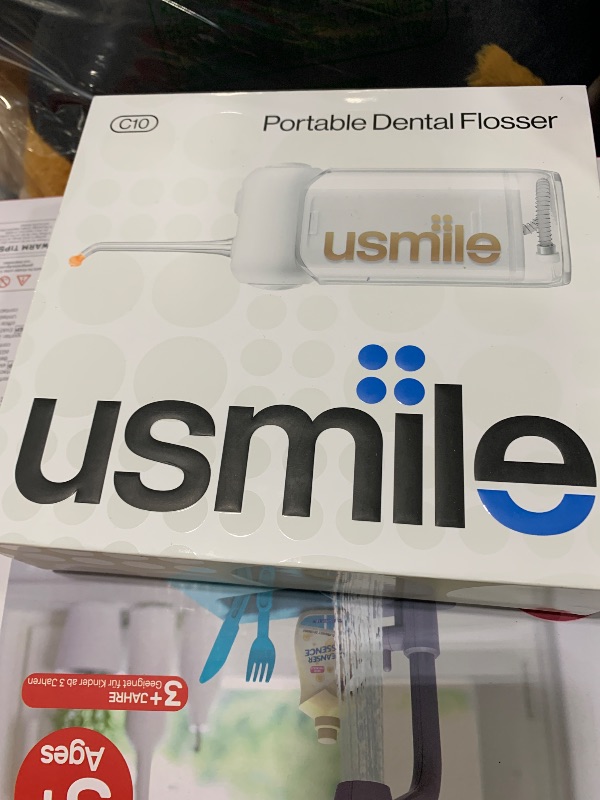 Photo 1 of usmile C10 Portable Water Flosser – Travel-Friendly, 95-Day Battery, 4 Modes, 360° Nozzle, 180ml Tank, IPX7 Waterproof, Dentist-Recommended for Braces, Implants & Sensitive Gums (White)