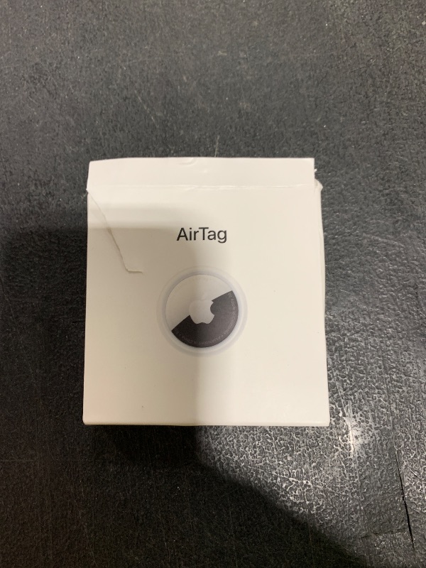 Photo 1 of Apple AirTag. Keep Track of and find Your Keys, Wallet, Luggage, Backpack, and More. Simple one-tap Set up with iPhone or iPad