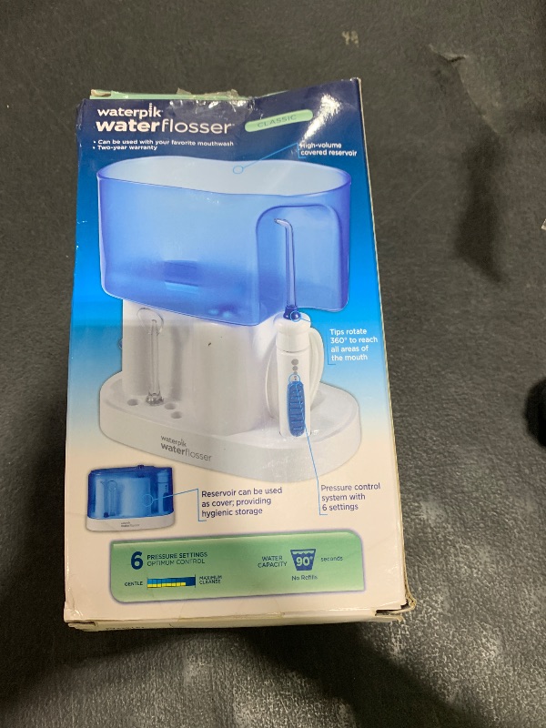 Photo 1 of Waterpik ION Professional Water Flosser, Rechargeable and Portable for Teeth, Gums, Braces, 10 Settings, 7 Flossing Tips For Multiple Users And Needs, ADA Accepted, WF-12 White, Packaging May Vary