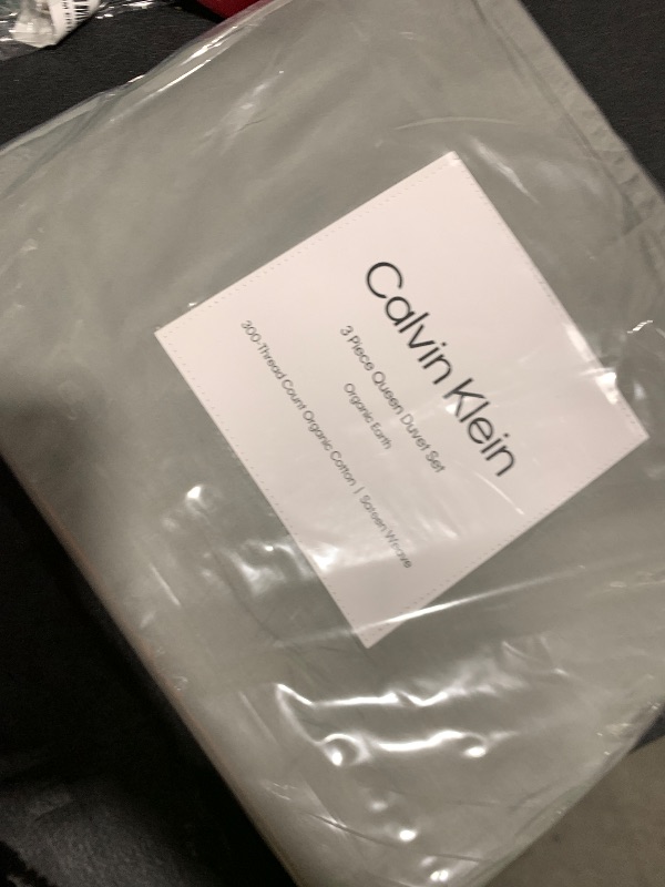 Photo 1 of Calvin Klein - Queen Duvet Cover Set, Organic Cotton Sateen Bedding, Luxuriously Soft Home Decor, GOTS Certified (Organic Earth Dusty Olive, Queen)