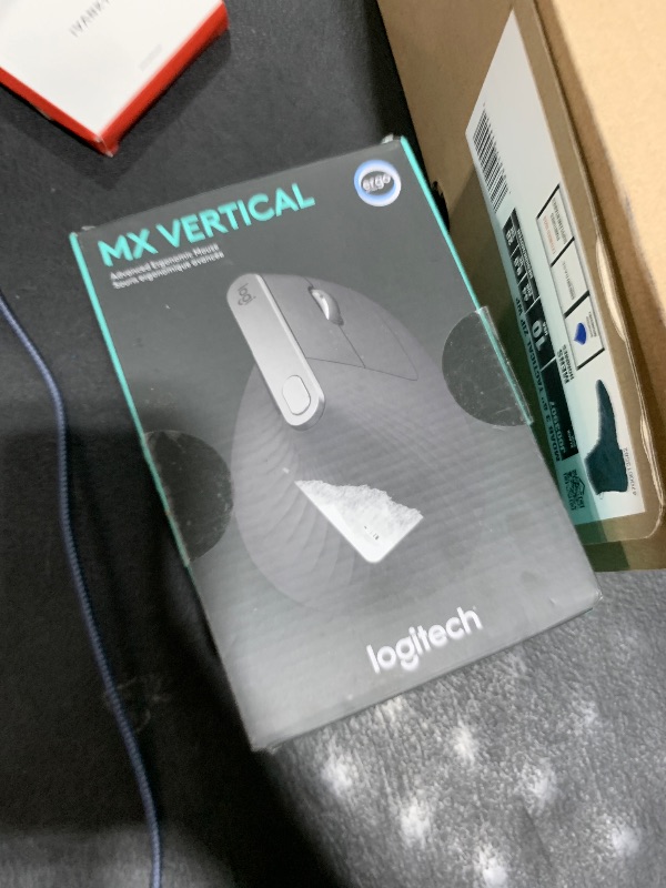 Photo 1 of Logitech MX Vertical Wireless Mouse – Ergonomic Design Reduces Muscle Strain, Move Content Between 3 Windows and Apple Computers, Rechargeable, Graphite