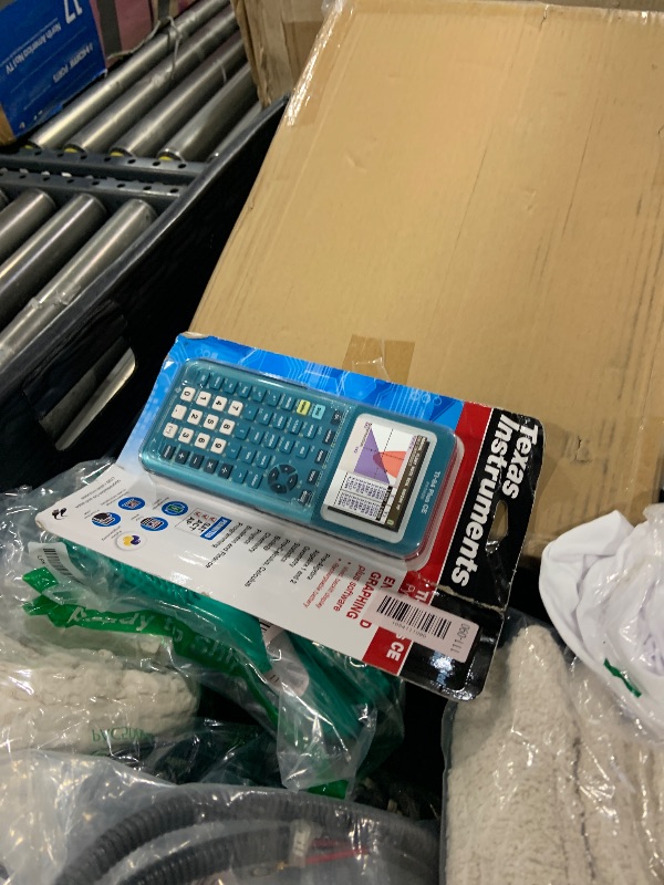 Photo 1 of TI-84 Plus CE Graphing Calculator, Trinomial Teal