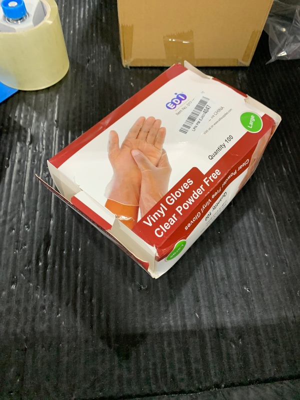 Photo 1 of EDI Disposable Vinyl Gloves - Clear, Powder-Free, Latex-Free, Ambidextrous, Large/Extra Large, 100 Count