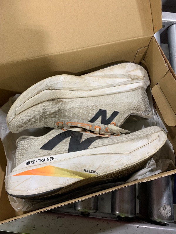 Photo 1 of New Balance Women's FuelCell SuperComp Trainer V3 Running Shoe, Angora/Hot Mango/Black, 11 Wide