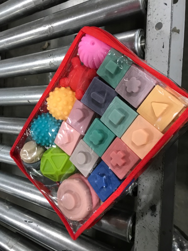 Photo 1 of Jyusmile Baby Toys 6-12 Months, Montessori Toy for Babies 6-12 Months, Incl Stacking Building Blocks & Soft Infant Teething Toys & Sensory Balls for Toddlers 0-3-6-9-12 Month