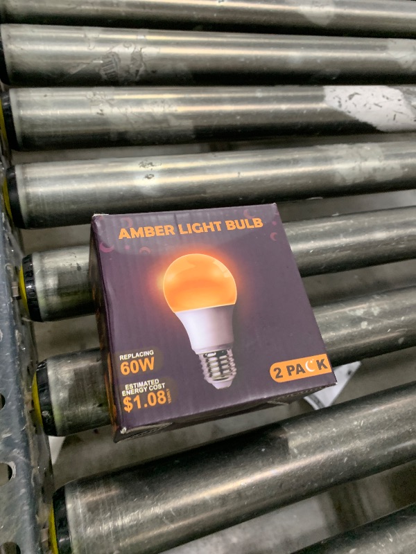 Photo 1 of DALUXshop Amber Sleep Light Bulbs, Blue Light Blocking, A19 9W(60 Watt Equivalent) Dim Light Bulbs for Lamp, 1800K Warm Light Bulb