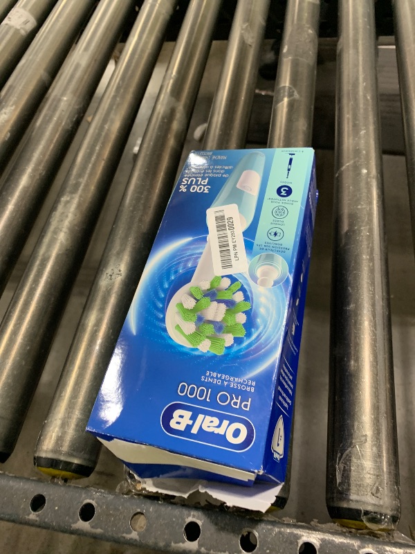 Photo 1 of Oral-B Pro 1000 CrossAction Electric Toothbrush, Green