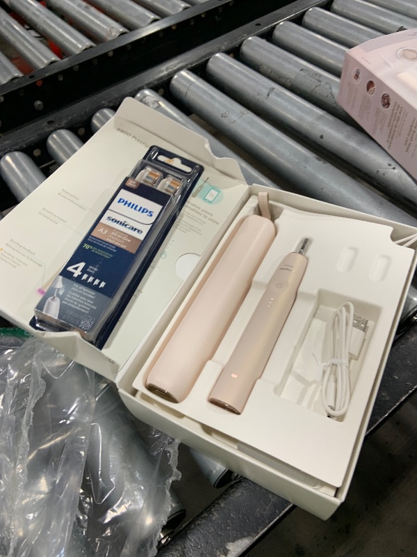 Photo 1 of Philips Sonicare DiamondClean Prestige 9900 Rechargeable Electric Toothbrush with SenseIQ, 5 Premium All-in-One Brush Heads, Plaque Removal, Gum Care, Whitening, Champagne, BD9001AZ