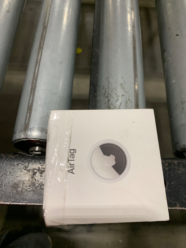 Photo 1 of Apple AirTag. Keep Track of and find Your Keys, Wallet, Luggage, Backpack, and More. Simple one-tap Set up with iPhone or iPad