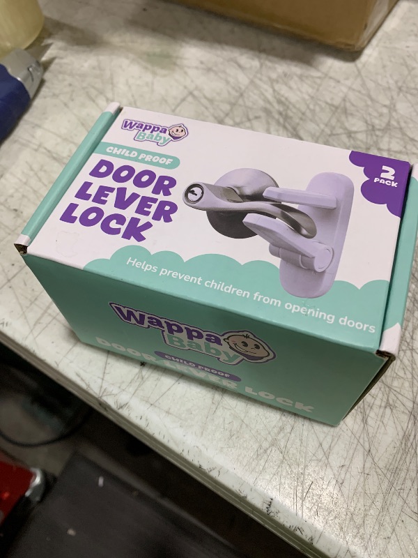 Photo 1 of Door Lever Lock (2 Pack) – Prevents Toddlers from Opening Doors – Easy One-Hand Operation for Adults – Durable ABS with 3M Adhesive Backing – No Tools Needed for Install