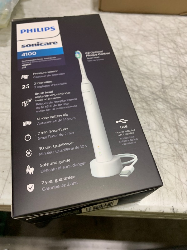 Photo 1 of Philips Sonicare 4100 Rechargeable Electric Toothbrush, Advanced Plaque Removal, Pressure Sensor, Includes Brush Head Case, White BD5002AZ