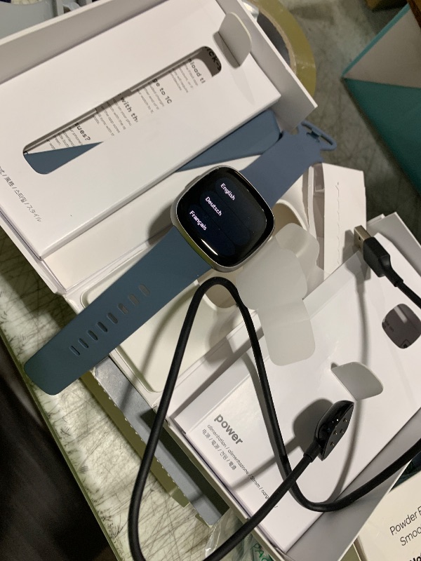 Photo 1 of Fitbit Versa 4 Fitness Smartwatch with Daily Readiness, GPS, 24/7 Heart Rate, 40+ Exercise Modes, Sleep Tracking and more, Waterfall Blue/Platinum, One Size (S & L Bands Included)