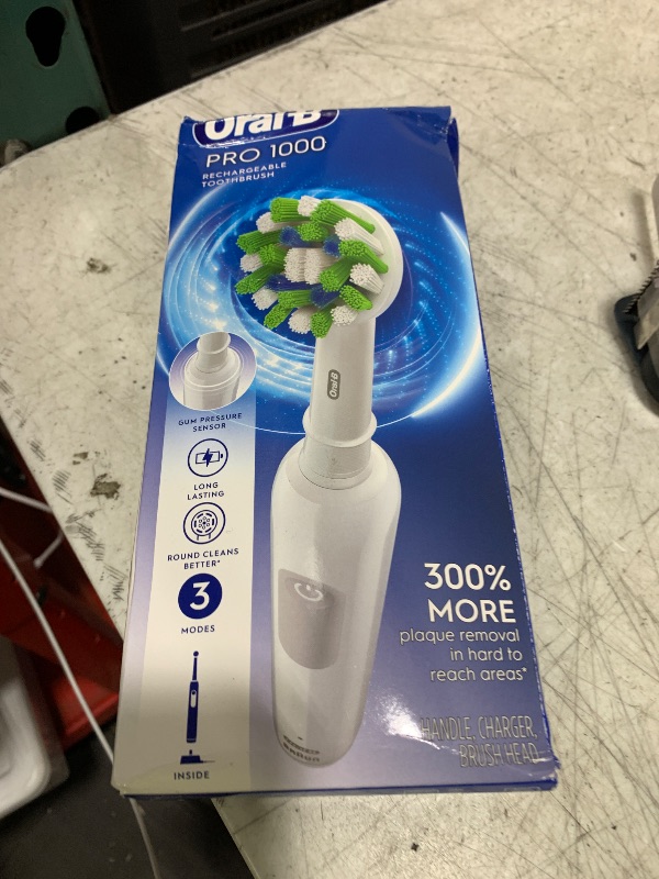Photo 1 of Oral-B Pro 1000 Rechargeable Electric Toothbrush, White