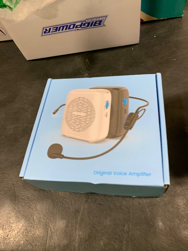 Photo 1 of (White) Portable Rechargeable Voice Amplifier for Teachers, Coaches, Tour Guides, presentations, and Meetings with a Large Number of attendees (White)