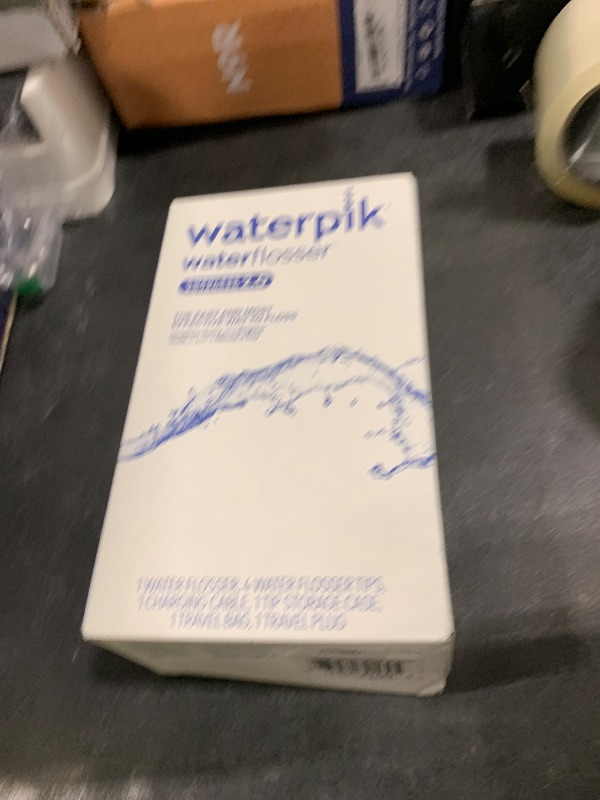 Photo 1 of Waterpik Cordless Advanced 2.0 Water Flosser For Teeth, Gums, Braces, Dental Care With Travel Bag and 4 Tips, ADA Accepted, Rechargeable, Portable, and Waterproof, White WP-580, Packaging May Vary