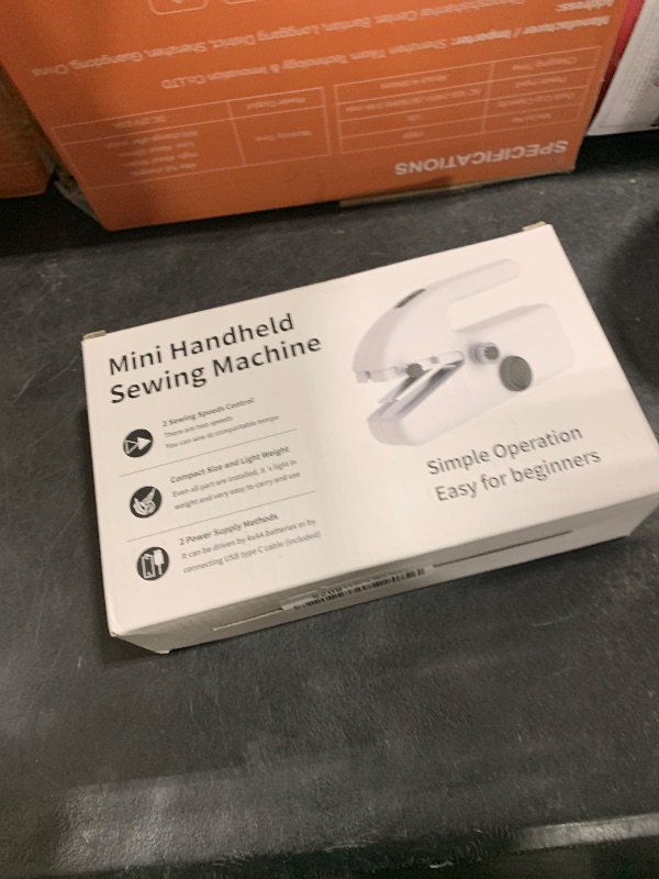 Photo 1 of Xamanabu Handheld Sewing Machine for Beginners, Portable Mini Sewing Machine with Two Speed Modes, Easy to Operate and Fast Stitch Suitable for Clothes, Fabrics and Quick Home Repairs