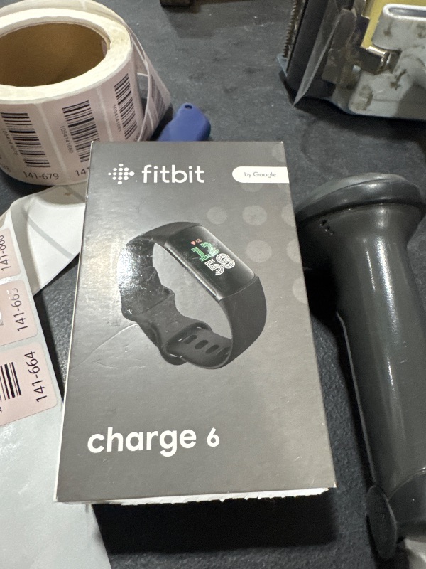 Photo 1 of Fitbit Charge 6 Fitness Tracker with Google apps, Heart Rate on Exercise Equipment, 6-Months Premium Membership Included, GPS, Health Tools and More, Obsidian/Black, One Size (S & L Bands Included)