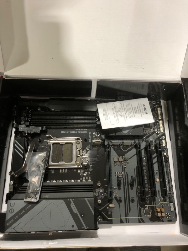 Photo 1 of GIGABYTE B650 Eagle AX AM5 LGA 1718 AMD B650 ATX, DDR5 Triple M.2, PCIe 5.0, USB 3.2 Gen2x2 Type-C, AMD Wi-Fi 6E, Realtek GbE LAN