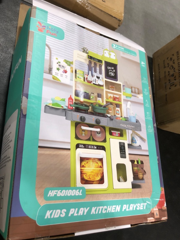 Photo 1 of HOLYFUN Kids Kitchen Playset, Pretend Play Kitchen with Sounds and Lights, Cooking Stove Steam,Play Sink and Play Food,Toy Kitchen Set for Kids Toddlers, Green