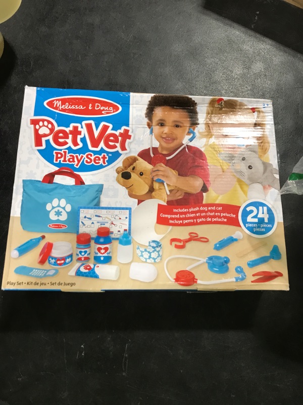 Photo 1 of Melissa & Doug Examine and Treat Pet Vet Pretend Play Set with Plush Dog and Cat (24 Pcs) Kids Veterinary Play Set, Veterinarian Kit for Kids, STEAM Toy, Pretend Doctor for Ages 3+