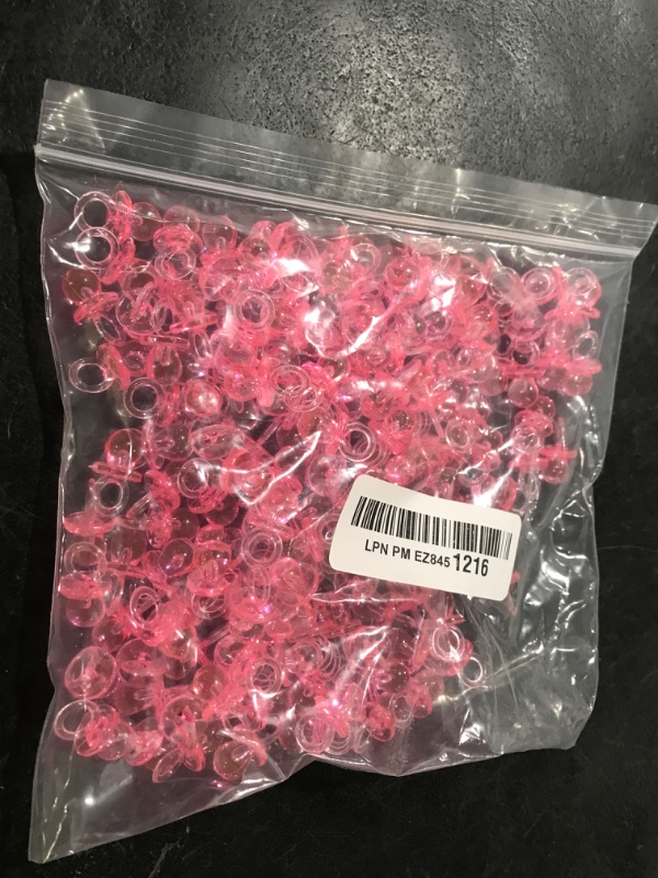 Photo 1 of XINHUIDALSQ 150 Mini Acrylic Pacifiers for Baby Shower Game, 0.86 Inch Bulk Chupones para Gender Reveal Party Favors Table Decoration (Pink)