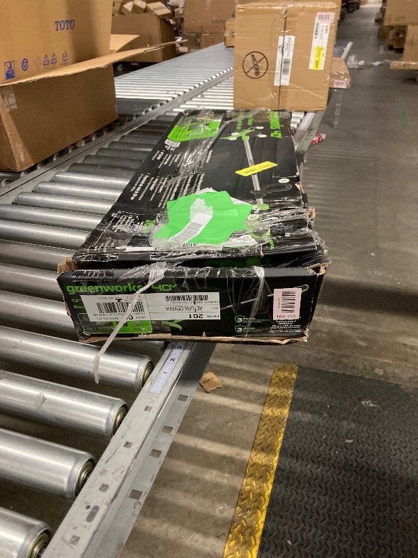 Photo 1 of **MISSING BATTERY***Greenworks 40V 12" String Trimmer with 2.0 Ah Battery & Charger 2101602