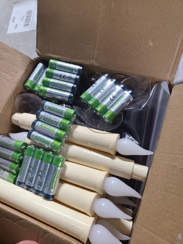 Photo 1 of 12 Pack Battery Operated Window Candles with Sensor Dusk to Dawn, Ivory Flameless Taper Candlesticks with Removable Black Base & Suction Cups, LED Candlestick for Christmas Decor Home, 24 AA Batteries