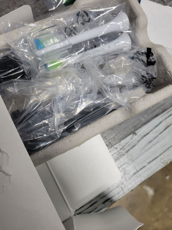 Photo 1 of Philips Sonicare ProtectiveClean 5300 Rechargeable Electric Toothbrush, with Pressure Sensor, 3 Cleaning Modes, SmarTimer and QuadPacer, with 2 Bonus Brush Heads, Travel Case, Black, Model HX6423/34