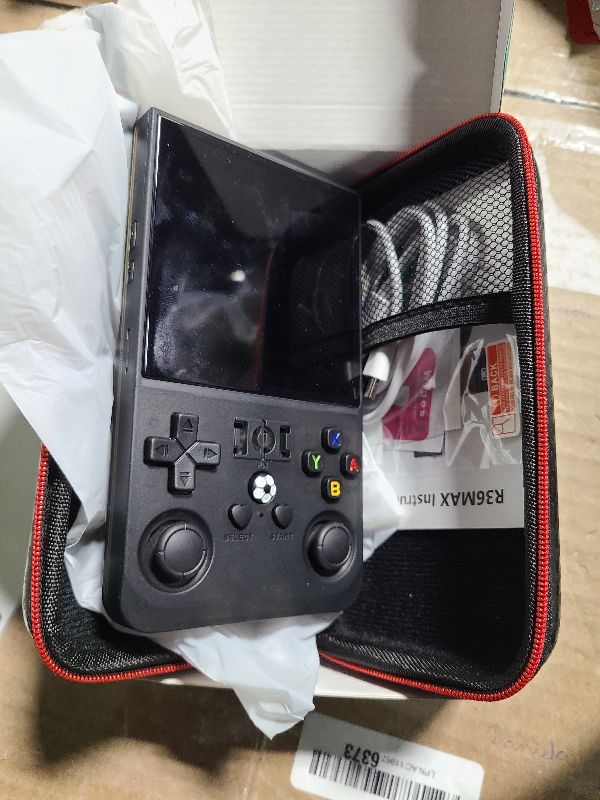 Photo 1 of ?R36MAX 4000mAh Portable Rechargeable Handheld Retro Game Console,Comfort Non-Slip Handheld Standing Retro Game Console with 64G TF Car,4.0-inch Screen,for Office,Black