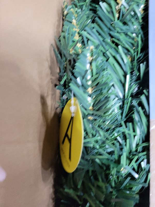 Photo 1 of 4ft Prelit Artificial Small Christmas Tree with Warm White Multi-Color LED Lights, Timer Battery Operated, Perfect for Xmas Tabletop Decorations, Home, Kitchen, Dining Table top Green