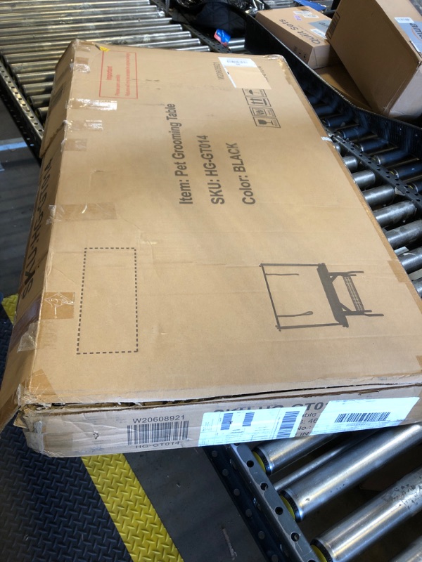 Photo 1 of SIMILAR TO STOCK PHOTO ---------------------------------------------------------------------------------------------VEVOR 50" Electric Pet Grooming Table, Heavy Duty Dog Grooming Arm for Large Dogs, Height Adjustable Dog Grooming Station, Anti Slip Tablet