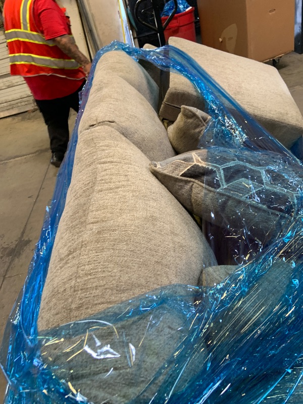 Photo 1 of Sofa —-with a hole and dirty covers 