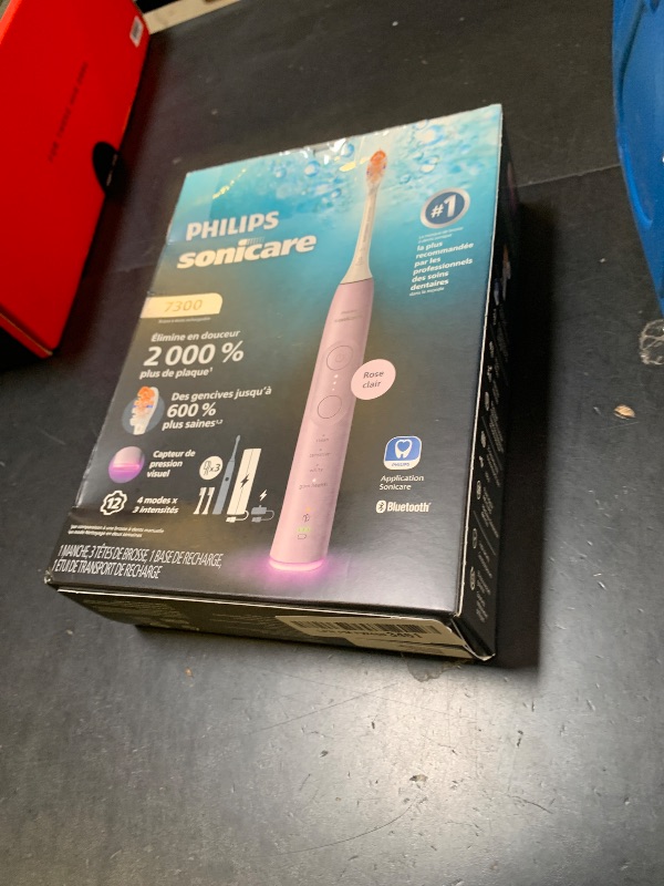 Photo 1 of Philips Sonicare 7300 Series Electric Toothbrush - Next-Generation Sonicare Technology, Pressure Sensor, 12 Brushing Settings, SmarTimer, 21-Day Runtime, Travel Case, Light Pink, HX7422/04
