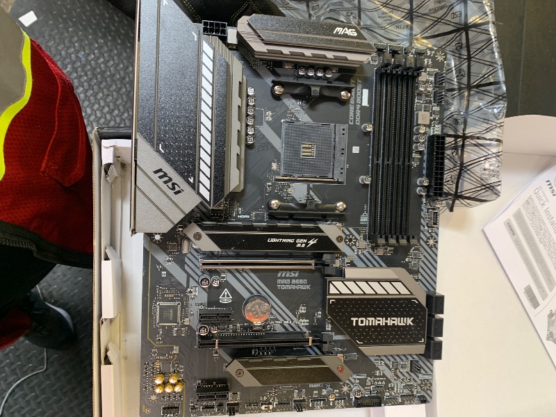 Photo 1 of **NOT FUNCTIONING** PARTS ONLY* MSI MAG B550 Tomahawk Gaming Motherboard (AMD Ryzen 5000 Series, AM4, DDR4, PCIe 4.0, SATA 6Gb/s, M.2, USB 3.2 Gen 2, HDMI/DP, 2.5Gbps LAN, ATX)