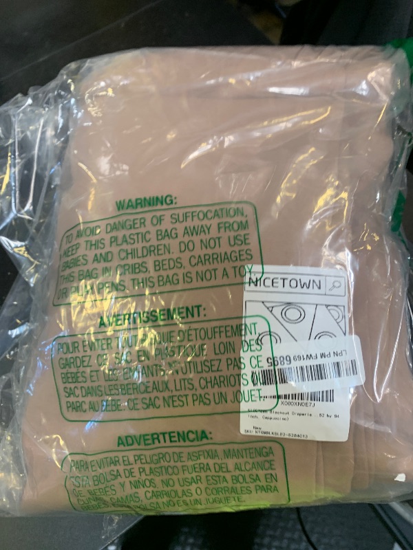 Photo 1 of NICETOWN Blackout Draperies Curtains Panels - Window Treatment Thermal Insulated Solid Grommet Blackout Curtains/Panels/Drapes for Bedroom (Set of 2 Panels, 52 by 84 Inch, Cappuccino)