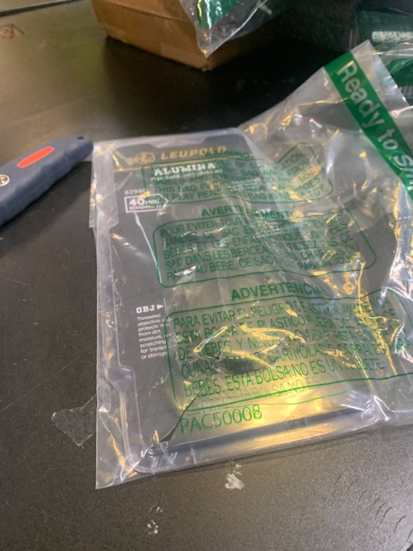 Photo 1 of Leupold Alumina Flip Back Lens Cover Kit - 40mm & Standard EP